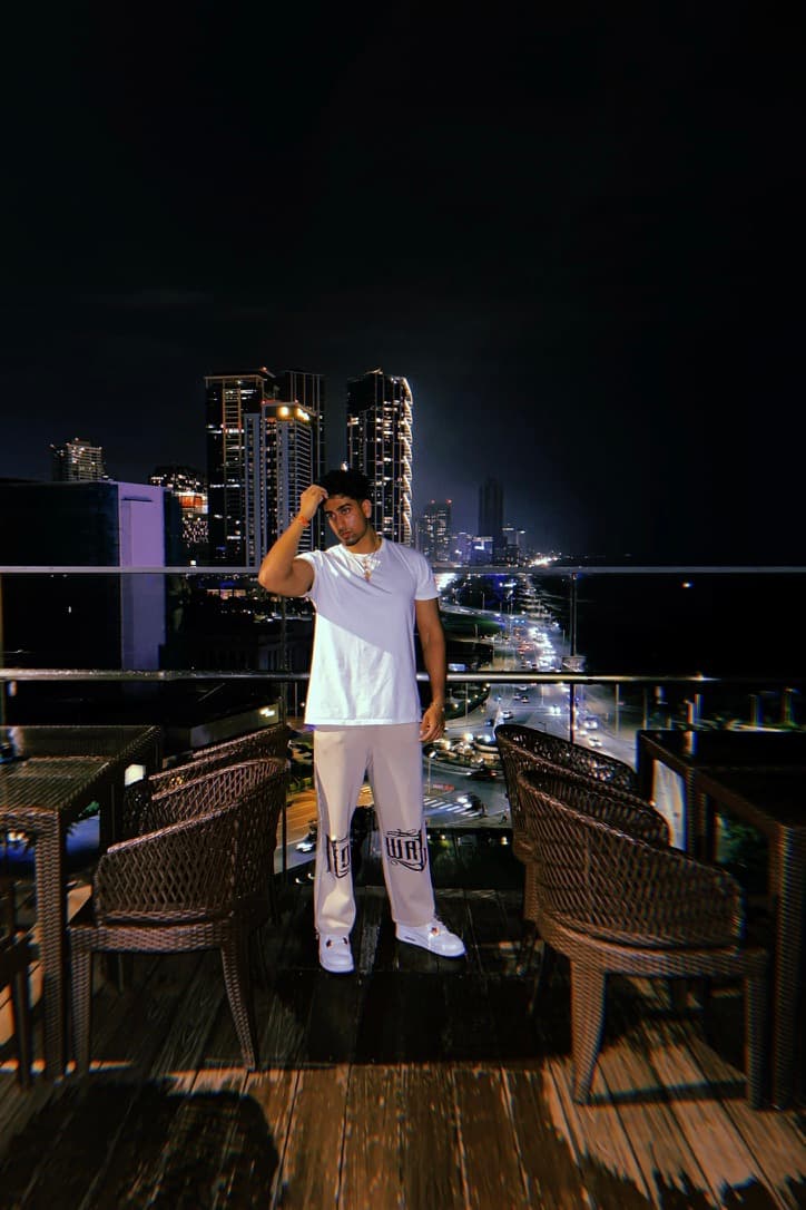 Rooftop night view with city skyline