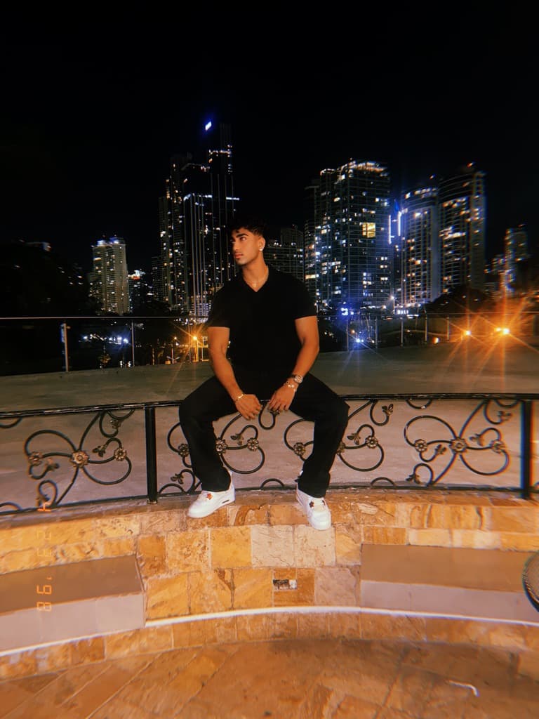 Night city view sitting on ledge
