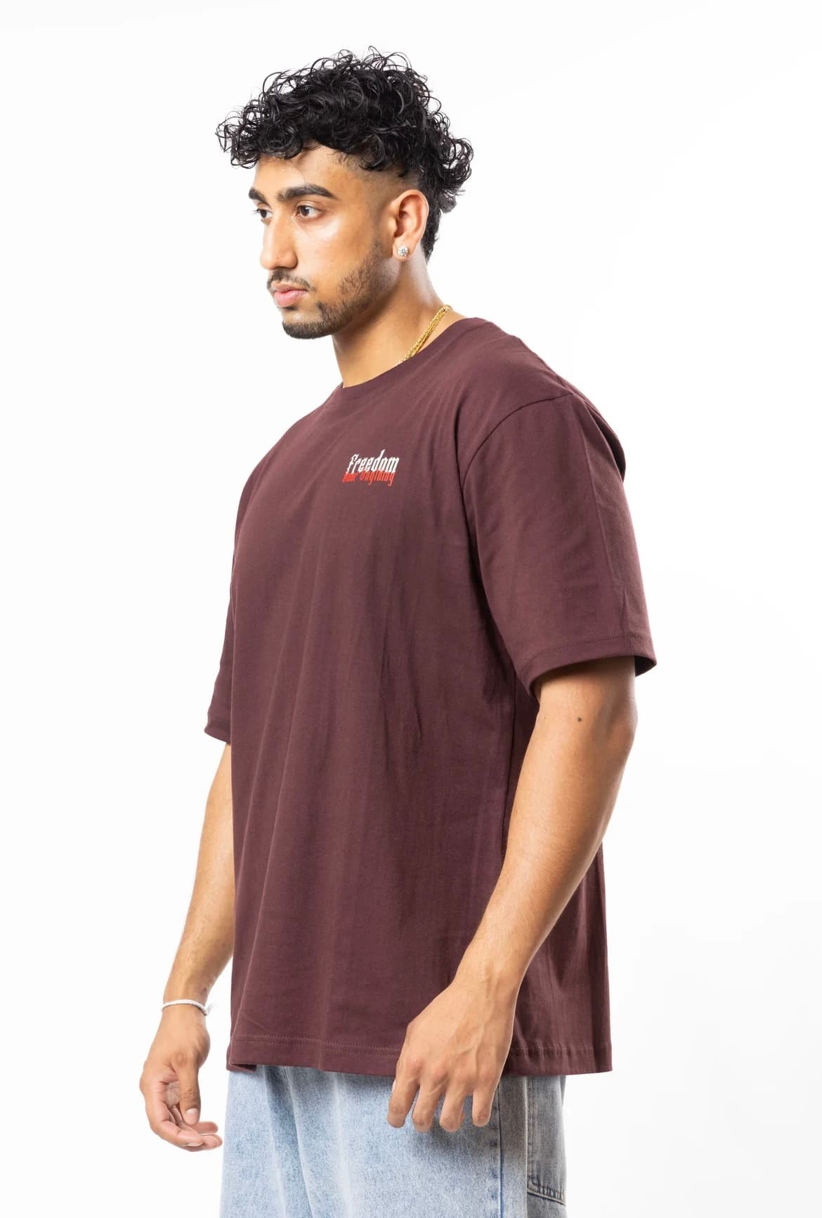 FOA burgundy Freedom t-shirt profile shot with light wash jeans