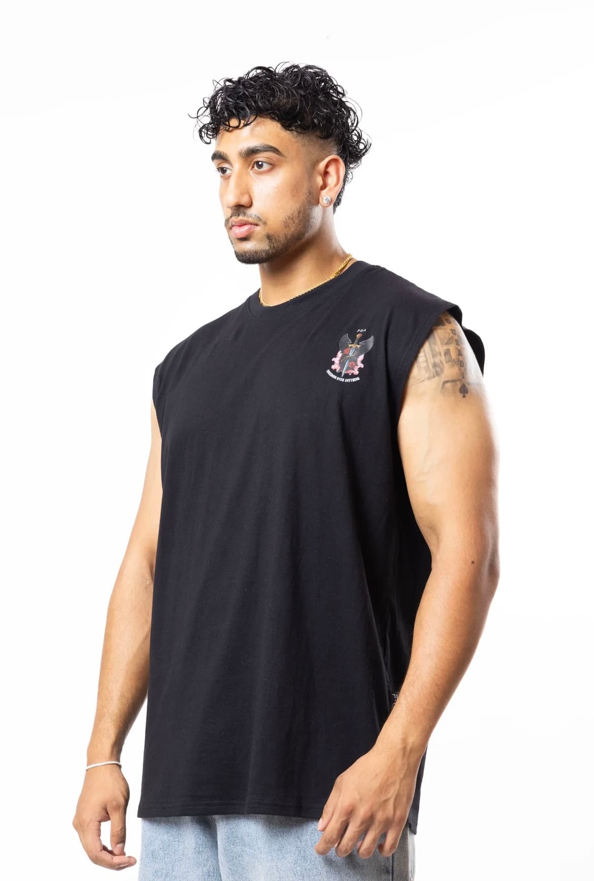 FOA black sleeveless shirt side angle showing tattoo
